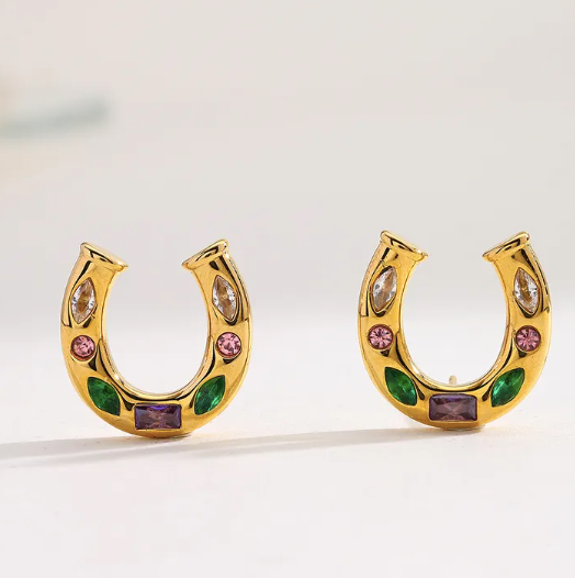 with colorful gemstones in green, pink, purple, and clear tones, symbolizing luck and style