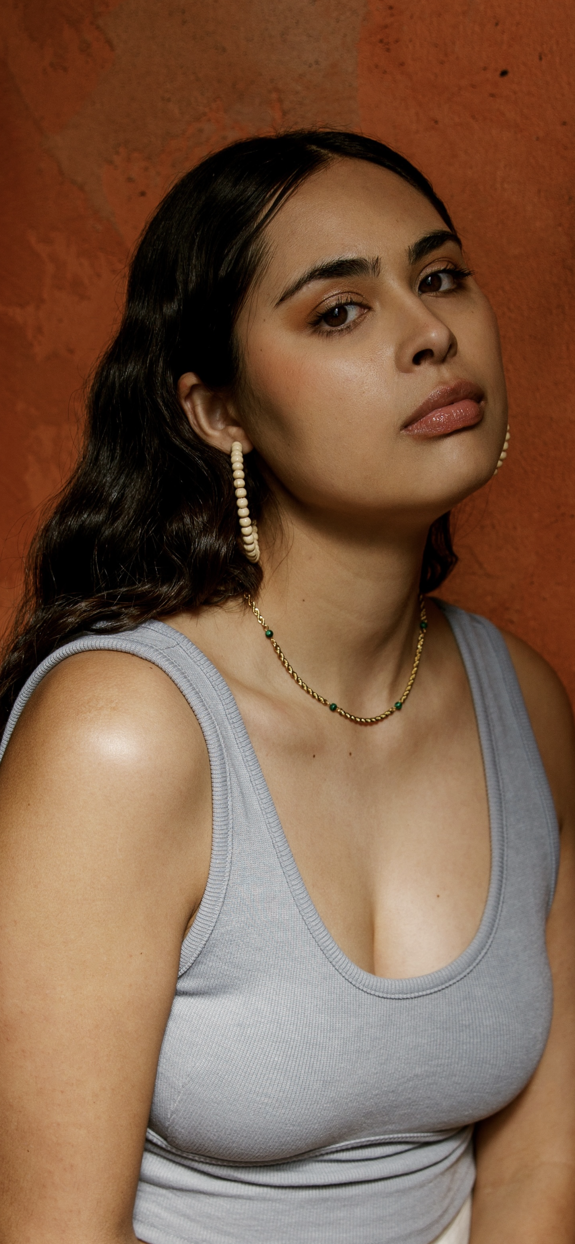 Handmade Hoop Beads earrings, nude color natural aesthetic. Latina girl wearing dainty and statement Jewelry