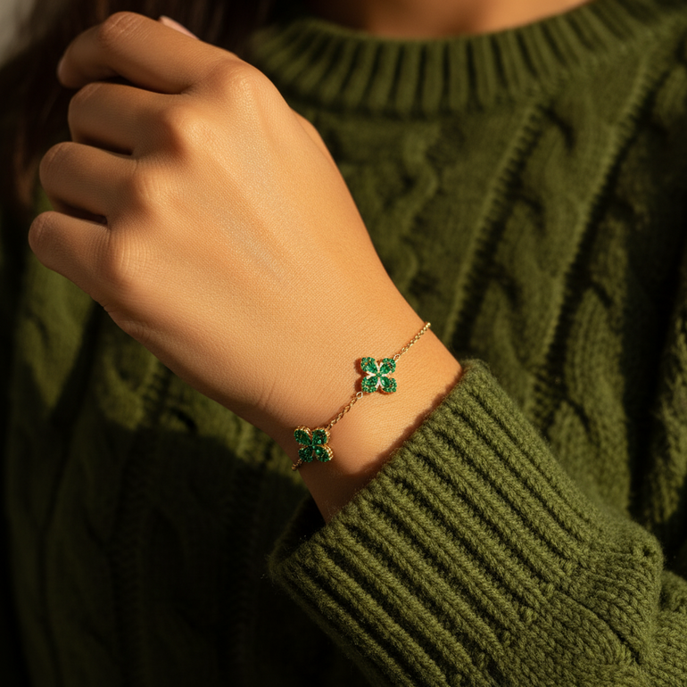 Emerald-green stones for luck + abundance

Gold-plated, hypoallergenic, and tarnish-resistant

Lightweight for everyday wear

The perfect Jefa-approved necklace for layering

A meaningful gift for yourself, your hermana, or your mamá