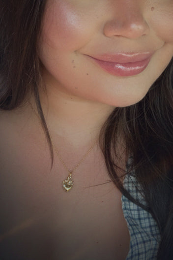 O Meta Description

Shop the Amor Inmortal Necklace, a Día de los Muertos-inspired gold heart necklace featuring delicate floral details and a meaningful symbol of eternal love and remembrance.