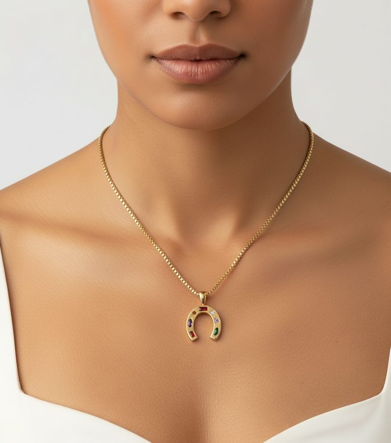18K Gold-Plated Stainless Steel

Multi-Gemstone Horseshoe Charm

Tarnish-resistant & water-friendly

18” chain with secure clasp

Hypoallergenic — made for sensitive skin

Designed for daily wear, shine, and good vibes