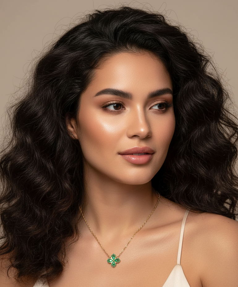 Emerald-green stones for luck + abundance

Gold-plated, hypoallergenic, and tarnish-resistant

Lightweight for everyday wear

The perfect Jefa-approved necklace for layering

A meaningful gift for yourself, your hermana, or your mamá